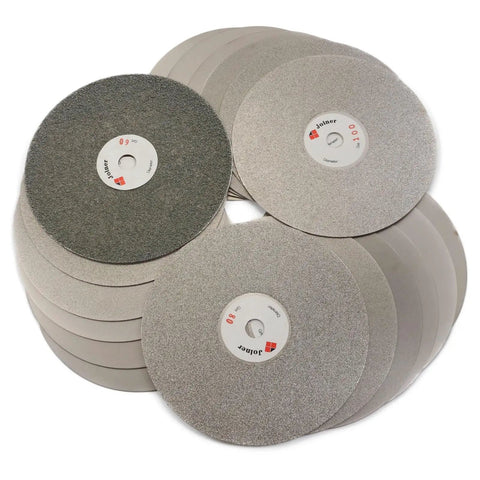 Heavy Duty Six Inch 2000 Grit Diamond Grinding Disc For Gemstone Glass And Rock Polish Tough As Nails For Knockout Lapidary And Hobby Crafting Projects stacked in a pile.