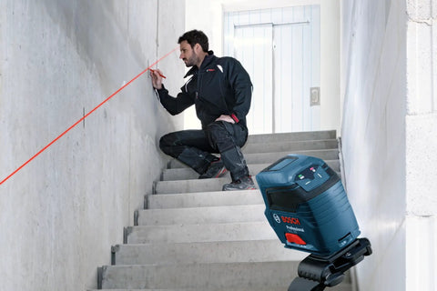GLL 55 Self Leveling Cross Line Laser With Visimax Technology Delivers Bright Line Visibility On Real Jobsites on stairs