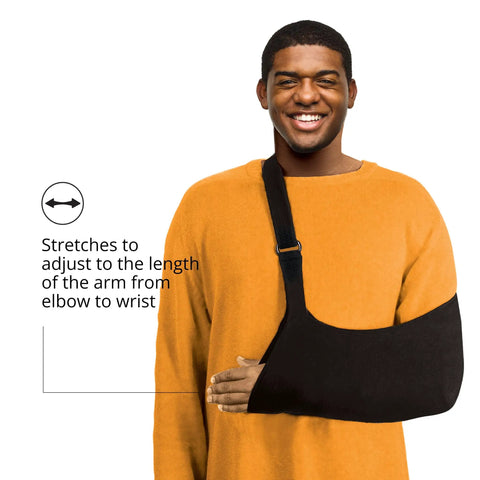 Super Comfy Adjustable Arm Sling For Shoulder Elbow Support With Soft Lightweight Fabric Easy Hook Loop Closure on a smiling man.