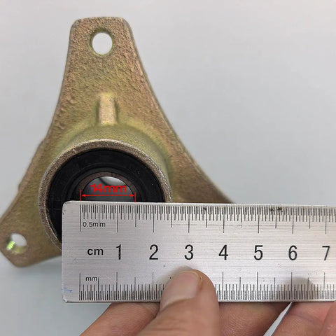 Beefed Up Front Wheel Hub With Sealed Ball Bearing 15MM Bore shown with ruler measuring 14mm bearing size.