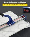 Heavy-Duty Manual Tile Cutter 31 Inch For Ceramic And Porcelain Tiles With Tungsten Blade guiding laser precision on marble surface.