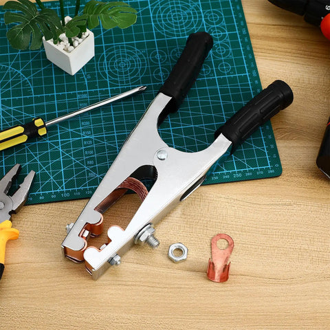Heavy Duty Welder Ground Clamp With Reinforced Copper Jaw For Superior Grip And RockSolid Electrical Connection During Any Serious Fabrication Or Repair Job on a work surface.