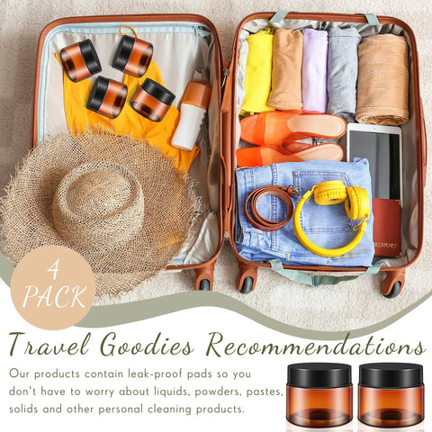 200 Piece 2 Oz Amber Plastic Cosmetic Jars Collection in travel bag with clothing, hat, and personal items for easy organization.