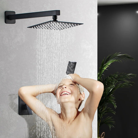 Child enjoying shower under Matte Black Rain Shower Head And 8 Inch Square Shower System With 3 Setting Handheld Spray Wall Mounted Faucet Set For A Dope Spa Quality Bathroom Upgrade Experience