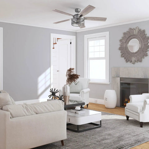 Carnegie 52 Inch Industrial Style Indoor LED Ceiling Fan with light and remote in a modern living room with dual finish blades.