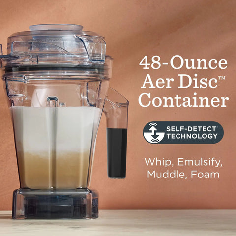 48 Ounce Aer Disc Blender Container With Self Detect Tech Tamper Low Profile And BPA Free, showing contents on wood surface
