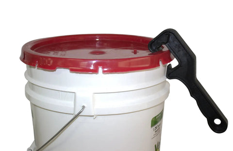 Must Have Bung Wrench Lid Lifter Tool For Food Storage Pails Quick Open No Seal Damage Durable Lid Lifter in use on red pail