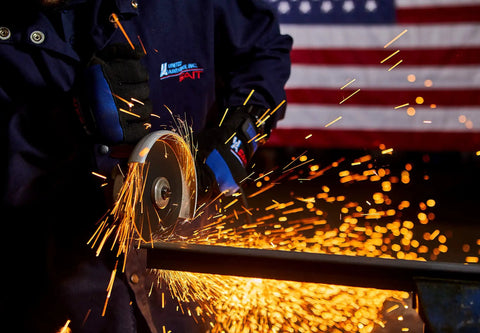 Worker using Z Tech High Performance Cut Off Wheels 4 1/2 Inch By.045 Inch By 7/8 Inch Type 27 Type 42 for metal cutting
