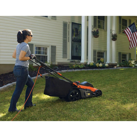 Woman using 20 Inch Corded Electric Lawn Mower With 13 Amp Motor Ultra Light No Sweat Push Design 3 In 1 Mowing Versatility