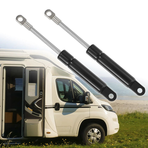 Rugged 6 Inch Lift Support Struts Deliver Hella Strong 35 Pound Gas Spring Performance To Effortlessly Raise RV Truck Car Boat Tailgates Hatch Covers And Windows Built Tough From Quality Carbon Steel with black finish, installed next to RV door.