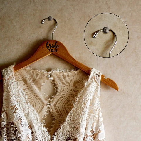 Double Headed Picture Hangers Nails Set With Small Head Pins holding lace dress on wood hanger showing hook detail