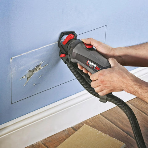 Worker using spiral saw with GP8 One Eighth Inch Drywall Guidepoint Cutting Bits Eight Pack For Precise Drywall Cuts With Guidepoint Tip