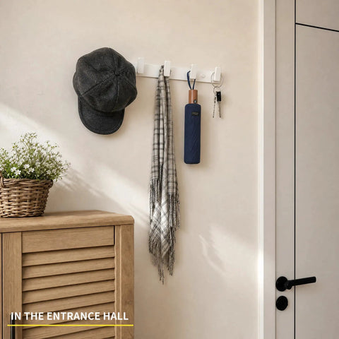 Heavy Duty Wall Mount Coat Rack Featuring Five Lock Down Hooks For All Your Everyday Essentials Like Hats Keys Wallets And Bath Towels Crafted From Corrosion Proof Aluminum In Crisp White Two Pack Bundle with hat, scarf, and keys.