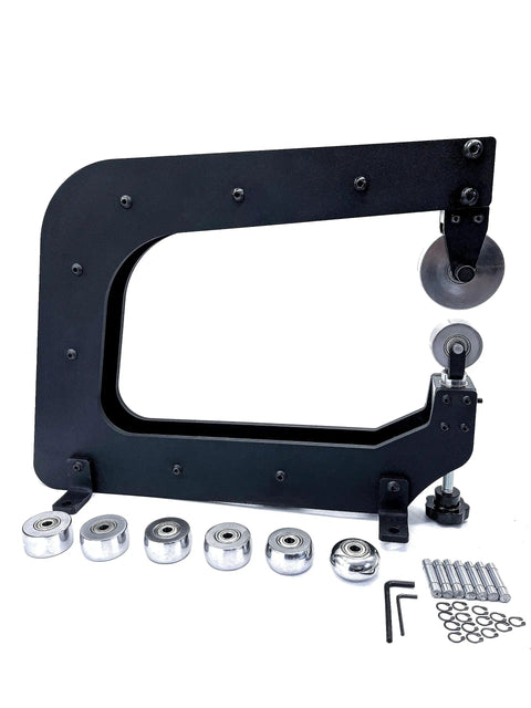 Real Deal Mini English Wheel Featuring 15 Inch Throat Depth and Seven Piece Anvil Wheel Set, black metal frame and chrome casting components.