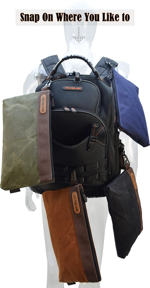 Four Pack 12 Inch Waxed Canvas Tool Pouches with Zippers displayed on backpack