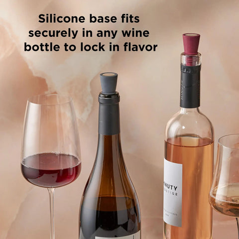 Preserve Your Opened Bottles With This Game Changing Set Of Four Multicolor Wine Stoppers crafted from food grade silicone in a wine bottle.
