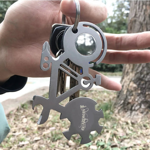 All In One Bicycle 10 In 1 Multitool Card For Everyday Carry And Keychain Access With Wrenches shown on a keyring outdoors