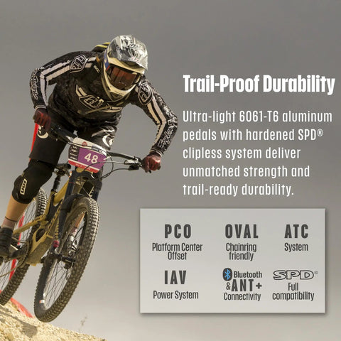 Mountain biker using Assioma Pro MX1 Upgraded Single Sided Power Meter Pedals Bundle With Extra SPD Cleats on rugged trail