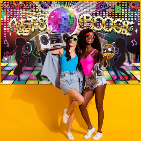 Two women posing in front of Disco Theme Photo Booth Backdrop Lets Boogie For 60s 70s 80s 90s Parties, large fabric backdrop.