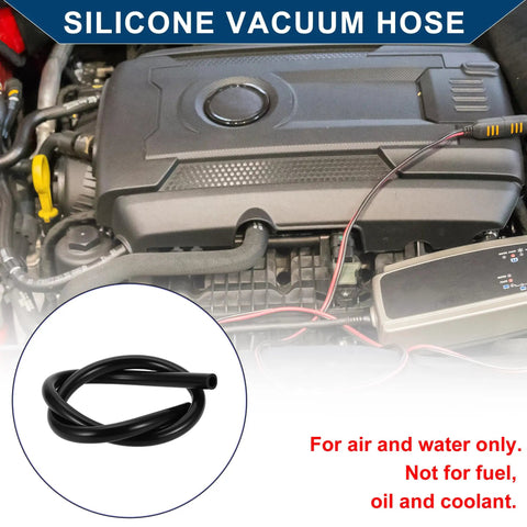 Beefy Silicone Vacuum Hose High Temp Automotive Vacuum Line Three Point Three Feet Long Twelve Millimeter Inner Diameter Three Point Five Millimeter Thick Black coiled in engine bay.