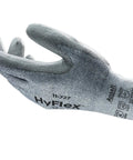 Cut Protection Gloves With Intercept Yarn ANSI A2 held up showing dark coated polyurethane abrasion resistant material, size small