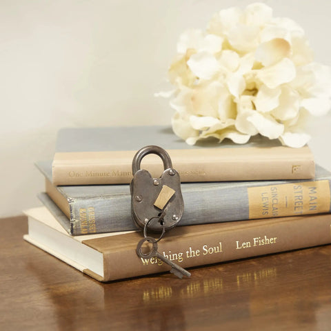 Brass Metal Lock And Key Decor Prop For Indoor And Outdoor Use Dark Gray Finish 1 Inch By 3 Inch By 2 Inch Size on books