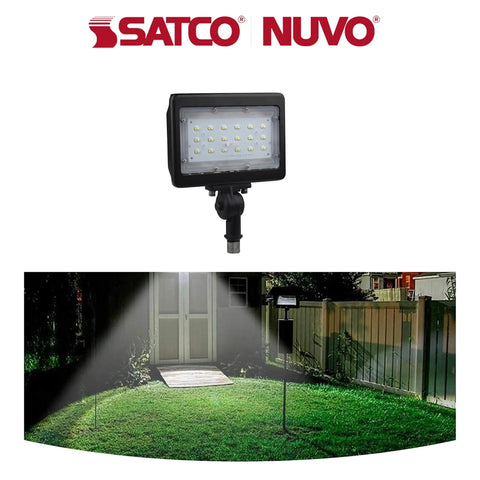 8 Pack Outdoor Led Flood Lights 30W 3000K Warm White Bronze Finish in use illuminating yard at night.
