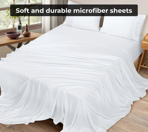 Super Soft Double Brushed Microfiber Full Flat Sheet Only Wrinkle Free Stain Resistant Hotel Quality Top Sheet For Your Full Size Bed In White Super Cozy Breathable 81 By 96 Inches on a bed with pillows.