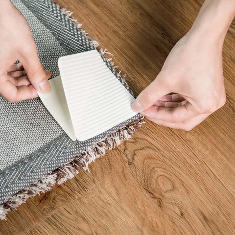 Applying Vacuum Tech Rug Pad Gripper For Hardwood Floors No Damage, Non Slip Under Rug Tape with corner flat on wood floor