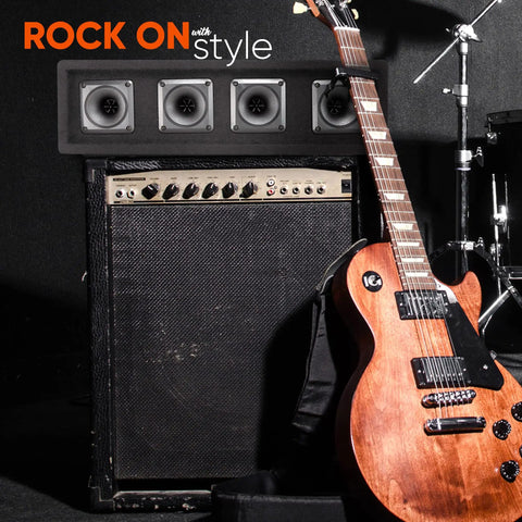 4 Way DJ Speaker System With 300 Watt Peak Power And 150 Watt RMS next to electric guitar, ideal for parties and clubs.