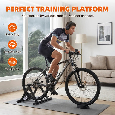 Cyclist using Indoor Magnetic Bike Trainer Stand With Six Level Resistance Fits 26 To 28 Inch And 700C Wheels in living room.