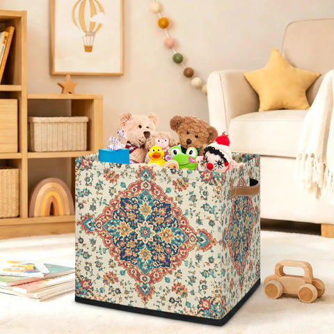 Straight Up 13 Inch Foldable Cube Storage Bin With Heavy Duty Handles For Closet Organization And Nursery Supplies Waterproof Flower Pattern Basket filled with toys.