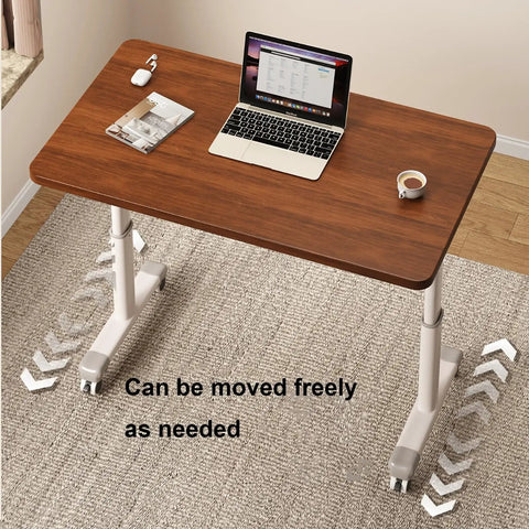 Adjustable Standing Desk With Legit Height Adjustment For Home Office And Gaming Setup Versatile Mobile Writing Table In Modern Gray with laptop and coffee.