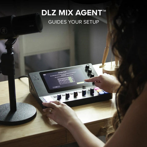 Person using Creator XS Adaptive Digital Mixer for Podcasting and Streaming with Mix Agent Tech on a desk setup.