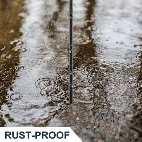 Close-up of a soil probe rod in wet ground, showing the metal structure and sharp tip. Soil Probe Rod 48 Inch Metal Locator Tool For Septic Tanks Underground Pipes Gopher Runs And Garden Soil Testing Sharp Tip Lightweight Ergonomic T Grip For Lawn And Yard Projects