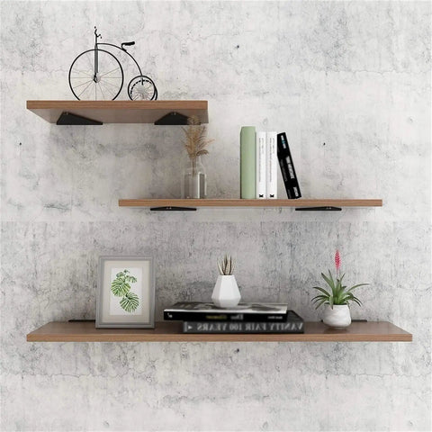 Heavy Duty Concealed Floating Shelf Brackets A Total Game Changer With Rock Solid Triangle Wall Mounts Easy Install Bracket Kit For DIY Home Decor displaying books and decor items.