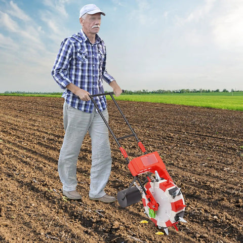 Man using Hand Push Seeder For Garden And Row Crops Walk Behind Manual Planter With Ten Nozzles Ergonomic Design in field