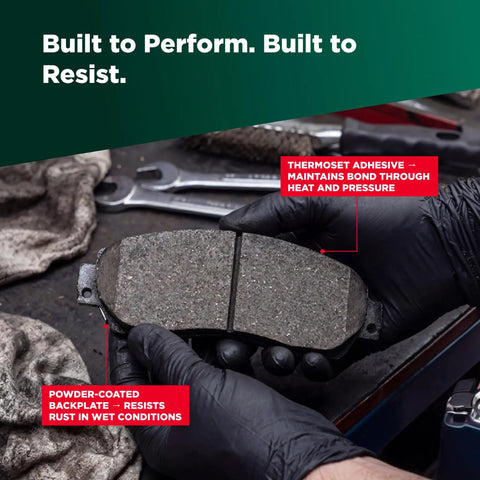 Ceramic Front Disc Brake Pad Set EC1731 for Mitsubishi Mirage shown with thermoset adhesive and powder-coated backplate