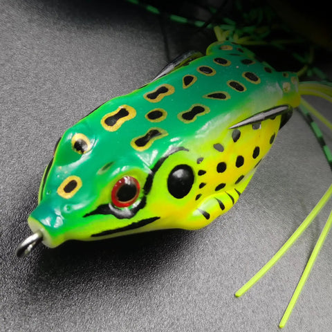 5 Pack Frog Lure Topwater Fishing Crankbaits Realistic Frog Soft Bait With 3D Eyes Lifelike Swimming Action Weedless Freshwater Bass Snakehead Musky Tackle 5.5cm 8g Bright Blue Green Yellow, close-up showing green-yellow coloration and 3D eyes.