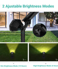 Solar Outdoor Lights 10 LED Landscape Spotlights, Two-In-One Wireless Adjustable Wall Lights highlighting brightness modes in yard