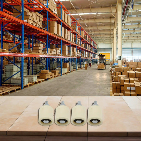 Four Pack Sliding Gate Guide Rollers With Quiet Nylon-Wrapped Wheels, Durable Bearings And Polypropylene Body on warehouse table.