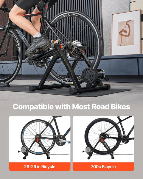 Foldable Magnetic Bike Trainer With Six Level Resistance Fits 26 To 29 Inch And 700C Road Wheels Indoor Cycling Stand shown with bike