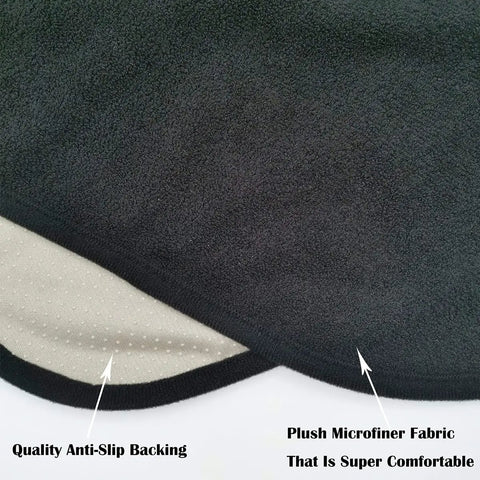 Close-up of black waterproof front seat cover protector showing plush microfiner fabric and quality anti-slip backing.