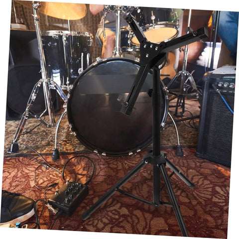 Rock Solid Foldable Drum Stand With Hella Sturdy Alloy Frame in a rehearsal space, showcasing stability and design for snare setup.