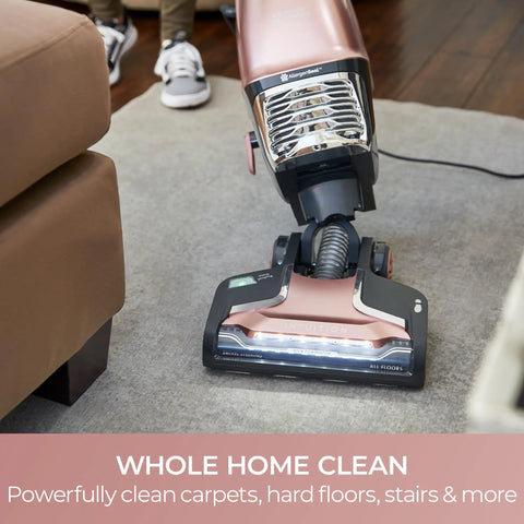 Kenmore Intuition Bagged Upright Vacuum With Hair Eliminator Brushroll on carpet, cleaning easily in pod mode.