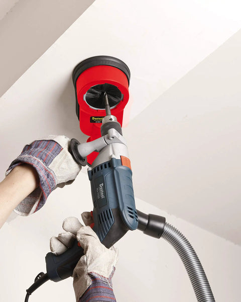 Universal Drilling Dust Shroud With Vacuum Suction For Three Eighths To Two And Five Eighths Inch Holes in use with drill on ceiling.
