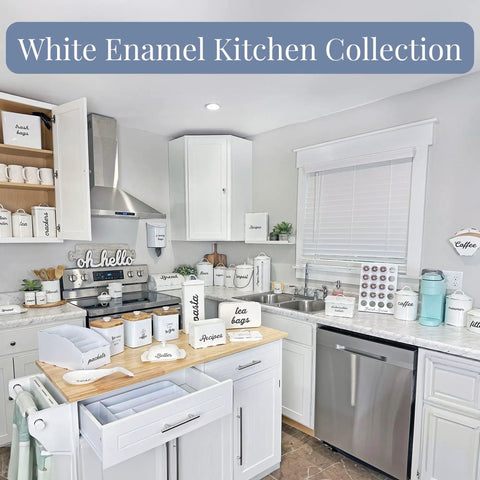 Enamelware Coffee Filter Holder Wall Mount Cone Shaped White Vintage Farmhouse Style Filter Storage Container With Distressed White Finish And Black Lettering For Classic Kitchen Organization on a counter.