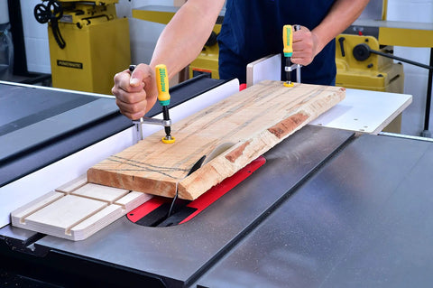 Person using Matchfit Dovetail Clamp Pro Bundle With Dado Stop Half Inch Shank DIY Router Jig Kit on table saw for woodworking.