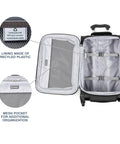Interior view of ultra lightweight carry on luggage showing recycled plastic lining and mesh pocket