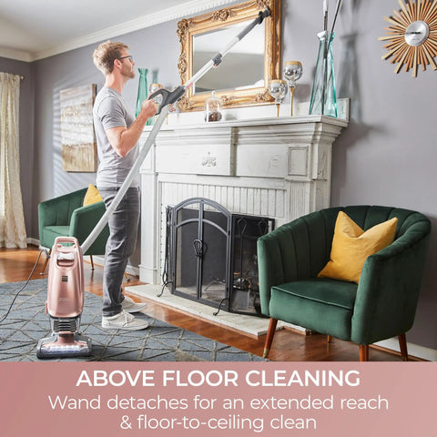 Kenmore Intuition Bagged Upright Vacuum With Hair Eliminator Brushroll in use for above floor cleaning, detachable wand extended.